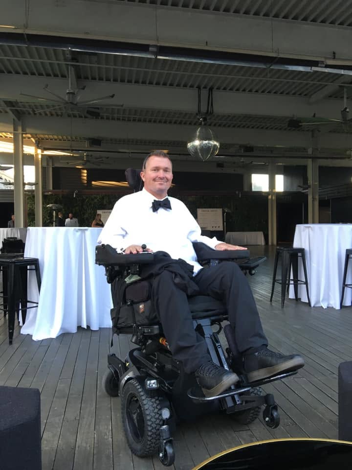 Charlie Merritt at a formal venue